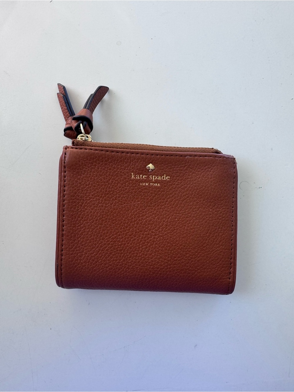 kate spade Brown Pebbled Leather Zip Wallet with Tassel